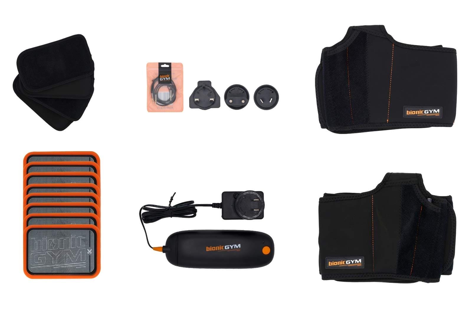 Exercise On Autopilot With BionicGym - BionicGym. Birds eye view of everything that's included in the box. Gel pads, wraps and extensions, aux cable, international charger, control unit